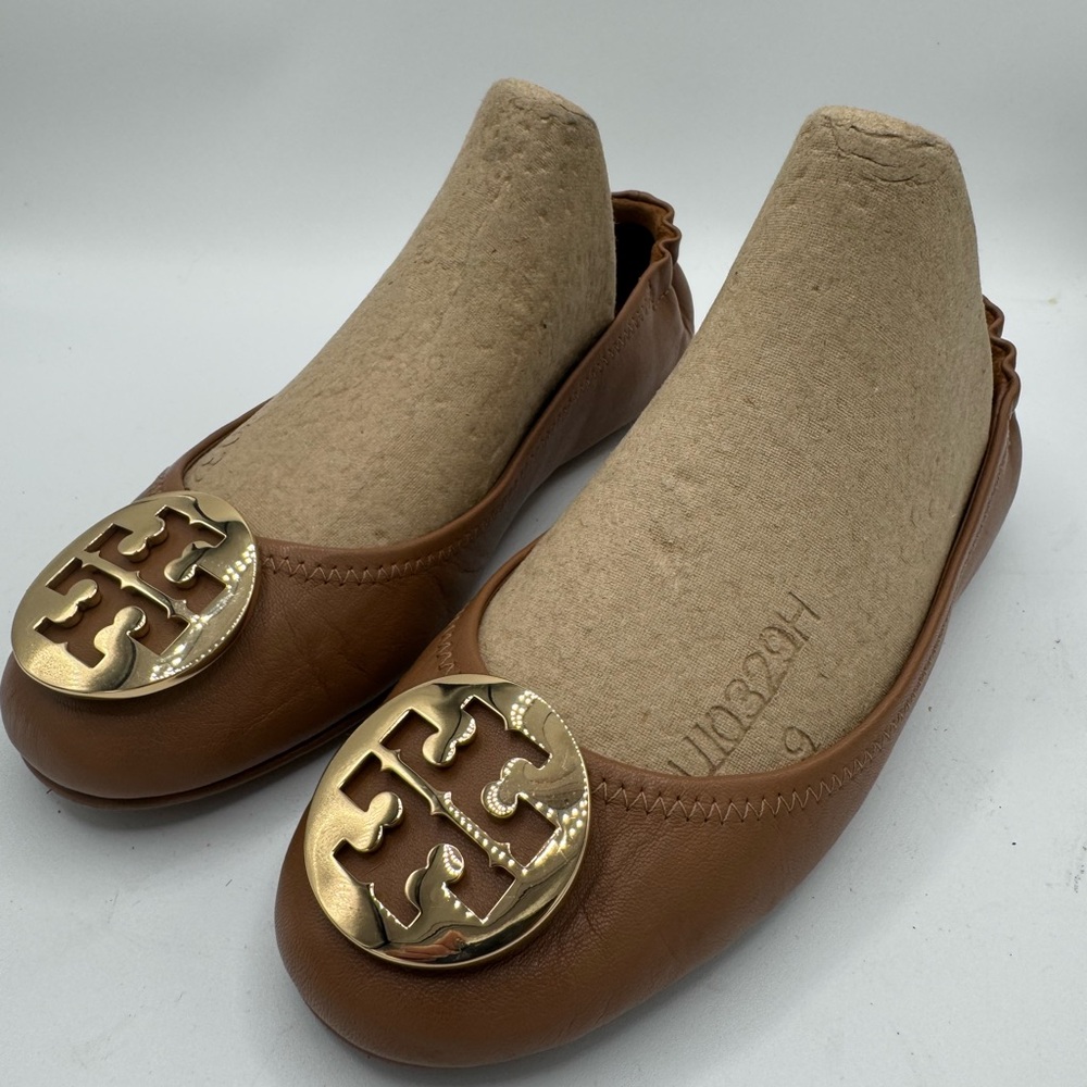 Tory Burch Brown Gold Flats with Signature Medallion. Style: Minnie